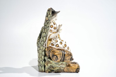 A French faience ink stand modelled as a seated Chinese, Lille, 18th C.