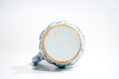 A Dutch Delft blue, white and manganese chinoiserie puzzle jug, dated 1690