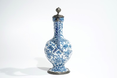 An attractive Dutch Delft blue and white gadrooned pewter-mounted jug, 2nd half 17th C.