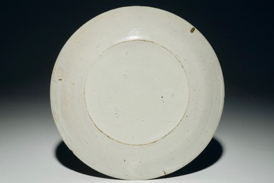 A Dutch Delft blue and white armorial plate, 1st half 18th C.