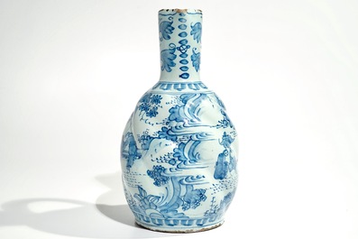 A Dutch Delft blue and white chinoiserie jug, 2nd half 17th C.