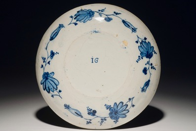 An armorial Dutch Delft blue and white alliance plate, 1st half 18th C.