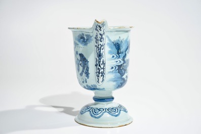 A Dutch Delft blue and white helmet-shaped ewer, 2nd half 17th C.