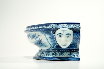 A blue and white French faience Delft style wall fountain and basin, Bourg-la-Reine, dated 1890