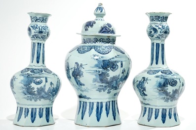 A large Dutch Delft blue and white three-piece chinoiserie garniture, 2nd half 17th C.