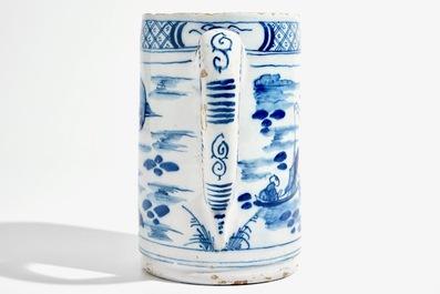 A large Dutch Delft blue and white chinoiserie beer mug, 18th C.