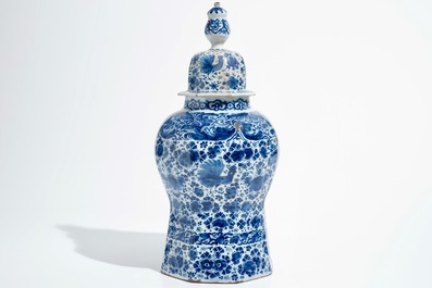 A large Dutch Delft blue and white covered vase, 18th C.