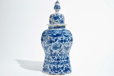 A large Dutch Delft blue and white covered vase, 18th C.