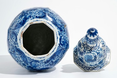 A large Dutch Delft blue and white covered vase, 18th C.