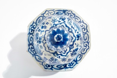 A large Dutch Delft blue and white covered vase, 18th C.