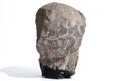 A Flemish carved stone bishop's head, 15/16th C.