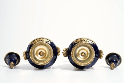 A pair of bronze-mounted Sevres style porcelain vases and covers, 19/20th C.