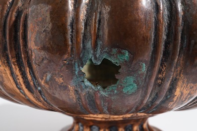 An exceptionally large brass jardiniere and two smaller ones, 17/18th C.