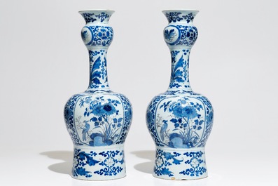 A pair of tall Dutch Delft blue and white chinoiserie vases, 1st half 18th C.