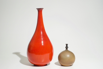 A modernist red glazed bottle vase and a globular brown vase, prob. Amphora, 2nd half 20th C.