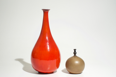 A modernist red glazed bottle vase and a globular brown vase, prob. Amphora, 2nd half 20th C.