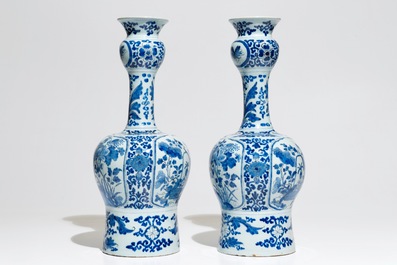 A pair of tall Dutch Delft blue and white chinoiserie vases, 1st half 18th C.