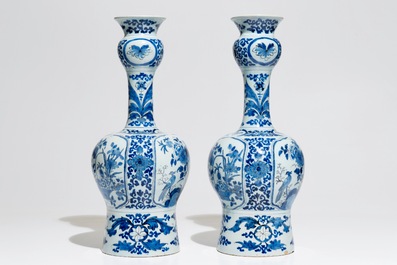 A pair of tall Dutch Delft blue and white chinoiserie vases, 1st half 18th C.