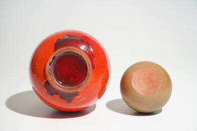 A modernist red glazed bottle vase and a globular brown vase, prob. Amphora, 2nd half 20th C.