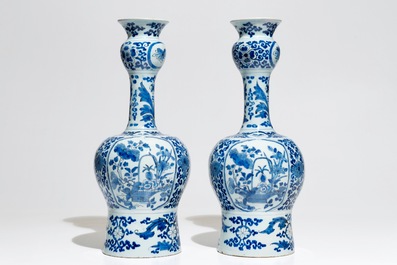 A pair of tall Dutch Delft blue and white chinoiserie vases, 1st half 18th C.