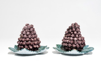 A pair of polychrome Dutch Delft tureens modelled as grapes, 18th C.