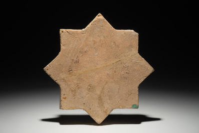 An Islamic luster glaze star tile, Kashan, Iran, 13th C.