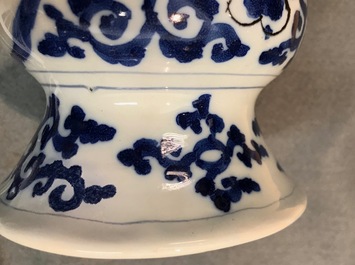 A pair of tall Dutch Delft blue and white chinoiserie vases, 1st half 18th C.