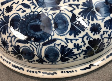 A large Dutch Delft blue and white spiced wine bowl and cover, 18th C.