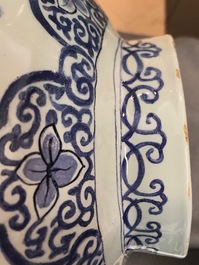A large Dutch Delft blue and white three-piece chinoiserie garniture, 2nd half 17th C.