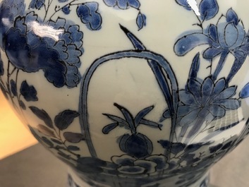 A pair of tall Dutch Delft blue and white chinoiserie vases, 1st half 18th C.
