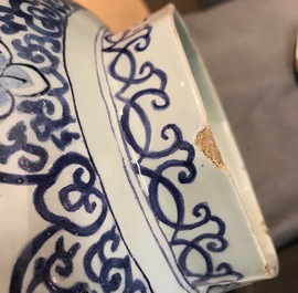 A large Dutch Delft blue and white three-piece chinoiserie garniture, 2nd half 17th C.