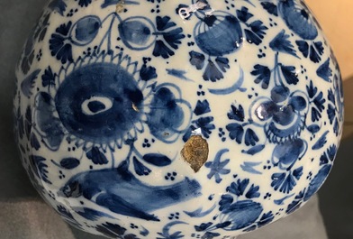 Three Dutch Delft blue and white garlic neck vases with birds on millefiori design, 18th C.