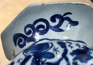 Three Dutch Delft blue and white garlic neck vases with birds on millefiori design, 18th C.