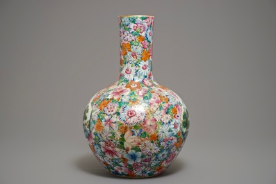 A large Chinese famille rose millefleurs tianqiu ping vase, Qianlong mark, 19/20th C.