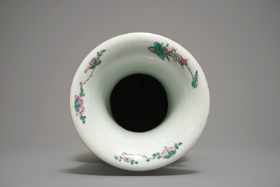 A large Chinese famille rose vase with peacocks and antiquities, 19th C.