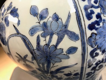 A pair of tall Dutch Delft blue and white chinoiserie vases, 1st half 18th C.