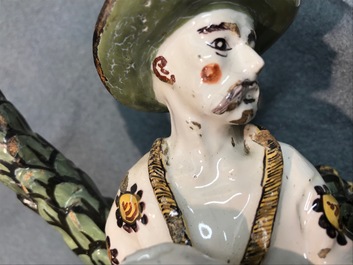 A French faience ink stand modelled as a seated Chinese, Lille, 18th C.