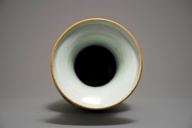 A Chinese famille rose vase with circular court scene design, 19th C.