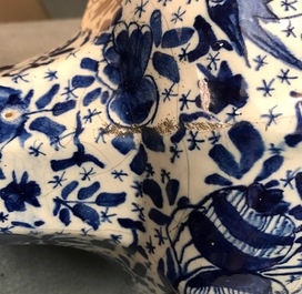 Three Dutch Delft blue and white garlic neck vases with birds on millefiori design, 18th C.