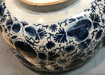 A large Dutch Delft blue and white spiced wine bowl and cover, 18th C.