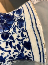 Three Dutch Delft blue and white garlic neck vases with birds on millefiori design, 18th C.