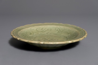 A Chinese Longquan celadon incised "Peony" dish, early Ming