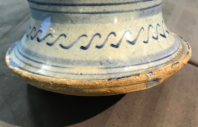 An Antwerp maiolica light blue ground wet drug jar, mid-16th C.