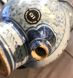 An Antwerp maiolica light blue ground wet drug jar, mid-16th C.