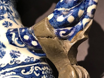 An attractive Dutch Delft blue and white gadrooned pewter-mounted jug, 2nd half 17th C.