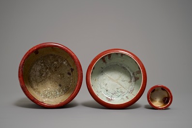 Two Chinese oxblood-glazed brush pots and an incense burner, 19/20th C.