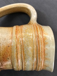 A large Raeren stoneware schnelle type mug with the arms of Frederick IV, dated 1604
