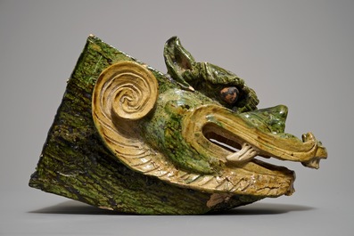 A Chinese roof tile shaped as a dragon's head, 19th C.