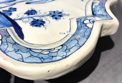 A Dutch Delft blue and white chinoiserie plaque with an elephant, 18th C.