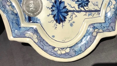 A Dutch Delft blue and white chinoiserie plaque with an elephant, 18th C.